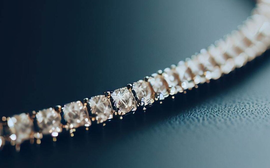 photograph of a diamond tennis bracelet with a single row of diamonds