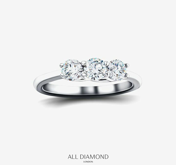 a trilogy or three-stone diamond engagement ring in white gold