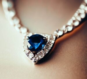 A Picture Of A Classic Sapphire And Diamond Necklace, With The Gemstones Complementing Each Other Perfectly.