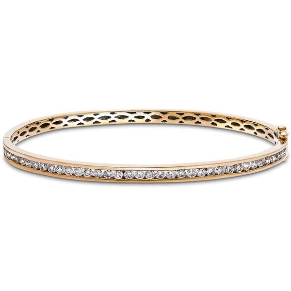 Superb Channel Set Diamond Bangle. Handcrafted With Care In The Uk, Our Craftsmen Have Combined A Whole Carat Of Beautiful, Ethically Sourced G/Si Quality Diamonds And Smooth 9K Rose Gold Stylishly To Achieve A Piece Equally At Home In Party Season Or The Office. Its Versatility Will Make This A Mainstay Of Her Wardrobe. 